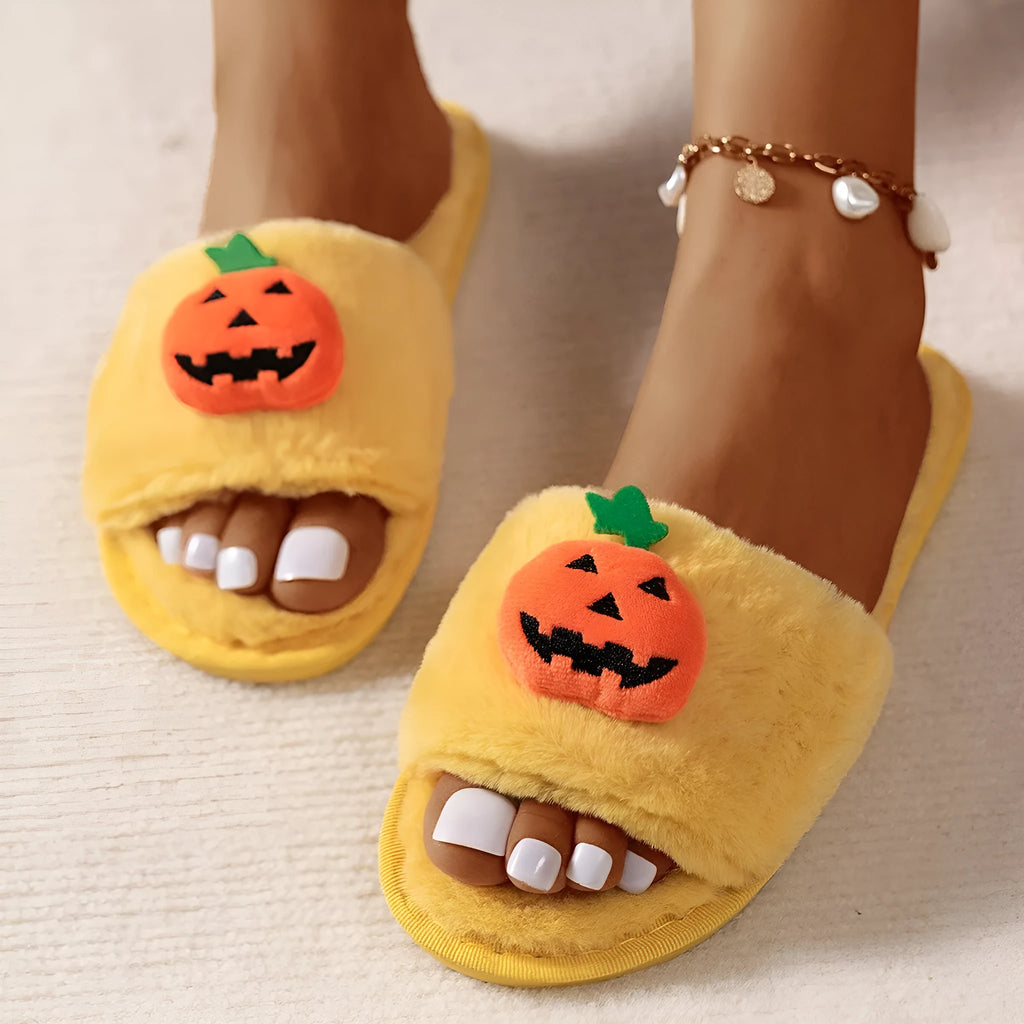 White and yellow Halloween cartoon pumpkin plush open-toe slippers with anti-slip PVC soles.