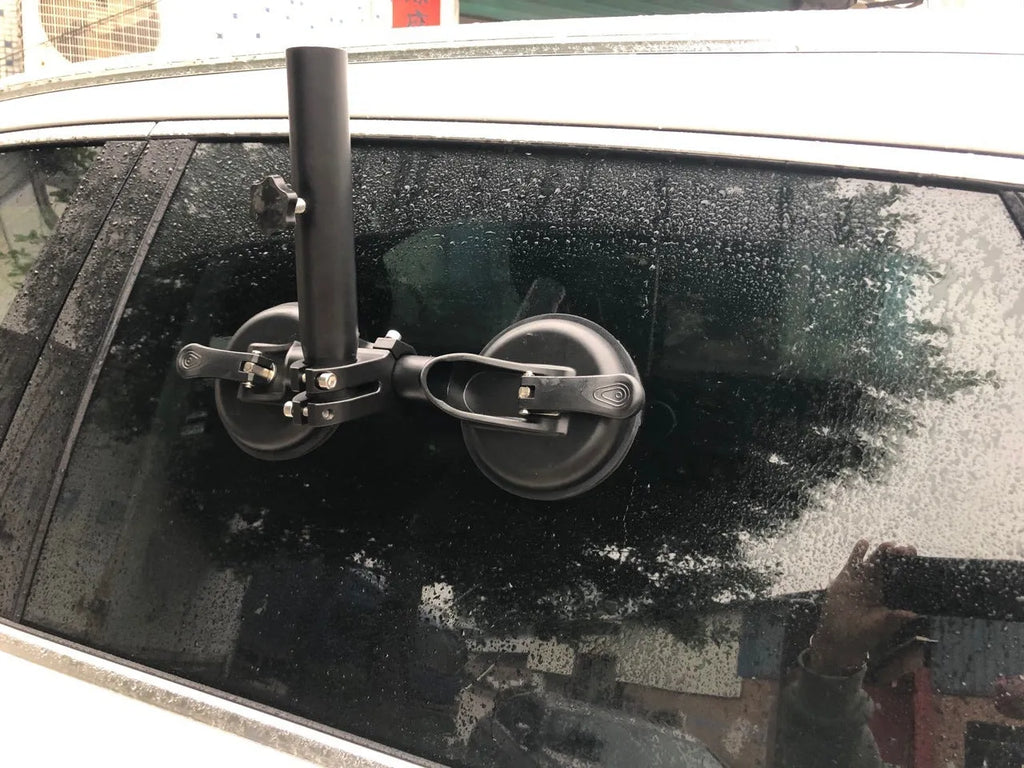 Black off-road car flagpole sucker base with round glass suction cup and rubber disc.