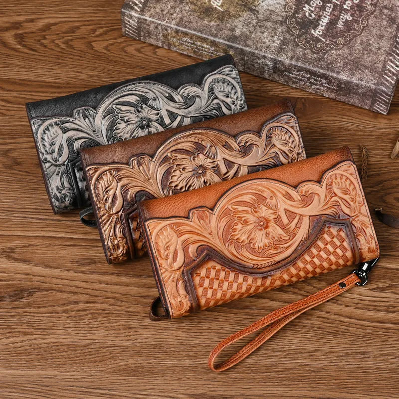 Women's retro brown tri-fold leather wallet with an embossed Chinese floral pattern, shown open.