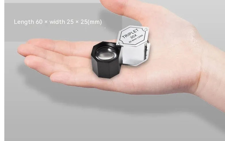 Handheld portable magnifying glass with metal body and optical glass lens for jewellery and coin identification
