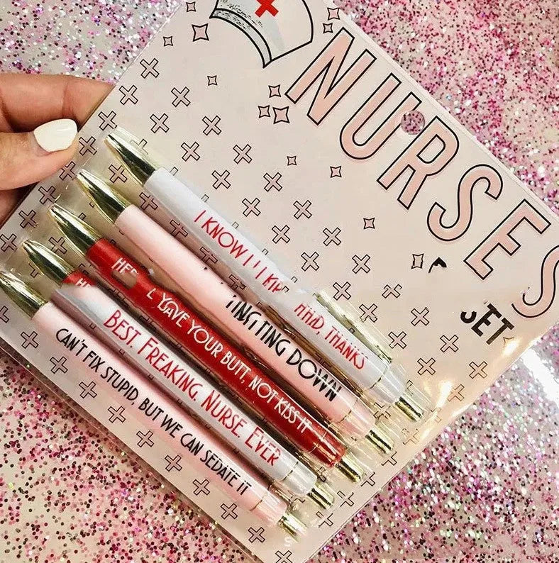 Five nurse-themed retractable ballpoint pens showing plastic construction and medical humour design elements