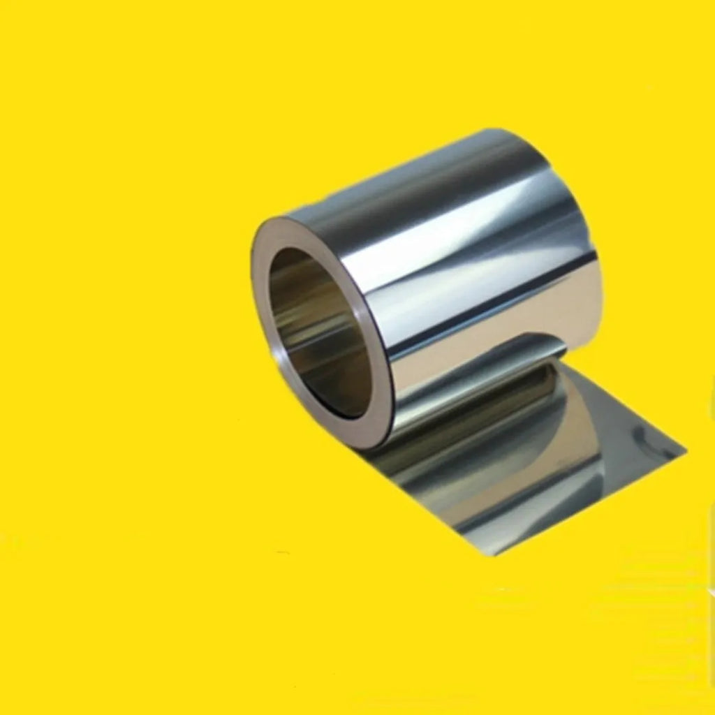 Close-up of a 304 stainless steel and leather adhesive strip for automotive use, showing its thin, metallic profile.