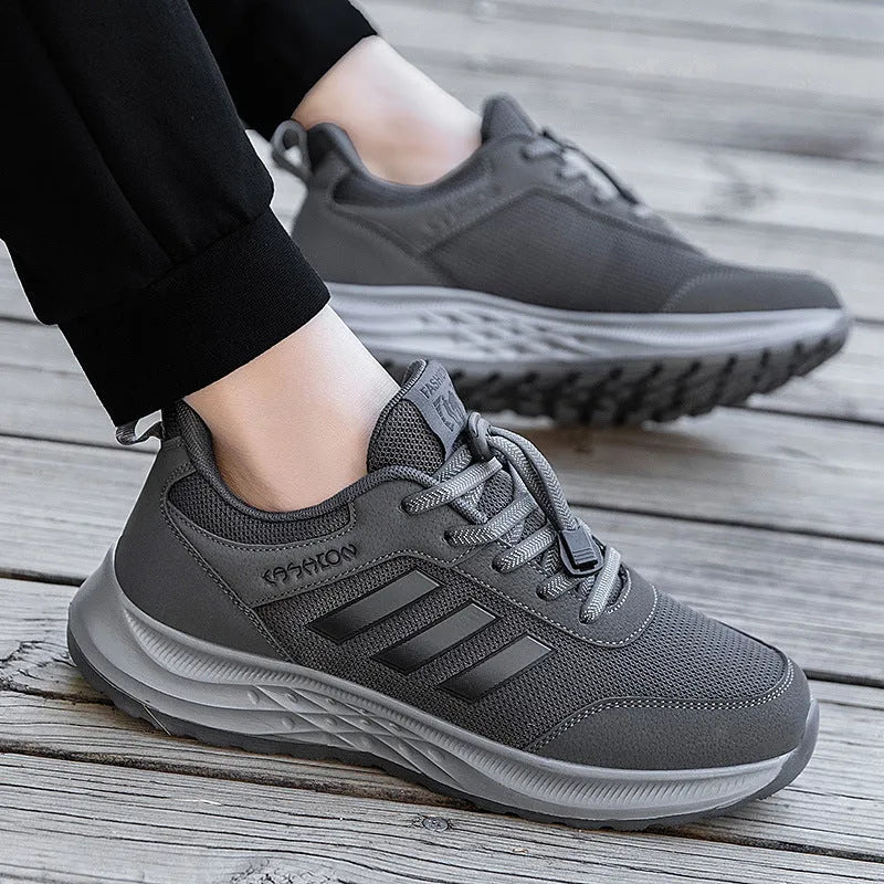 Breathable mesh mum shoes with non-slip sole and elastic band in purple, black, and dark grey colours.