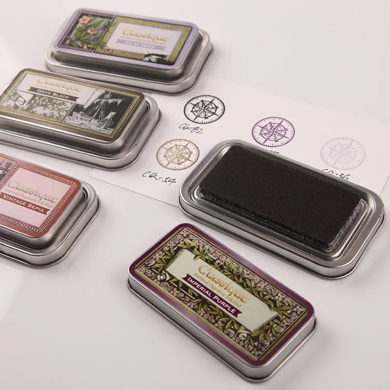 Rectangular oily ink pad for rubber stamps in five colours on a craft surface