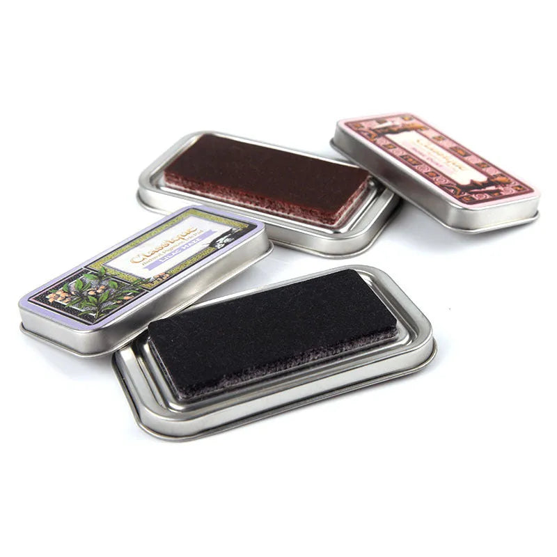 Rectangular oily ink pad for rubber stamps in five colours on a craft surface