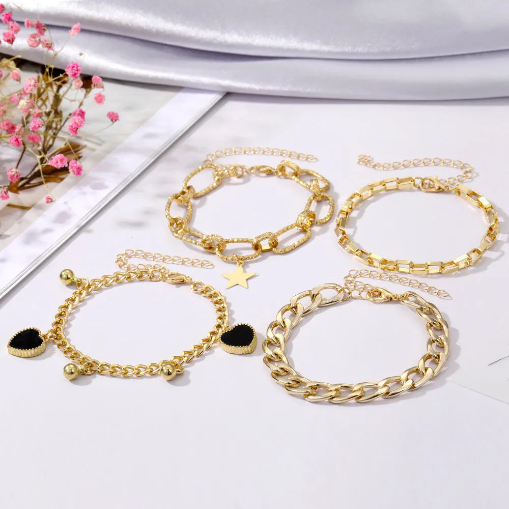 Black Peach Heart Retro Simple Multi-layer Alloy Bracelet for Women with Star and Heart Motifs