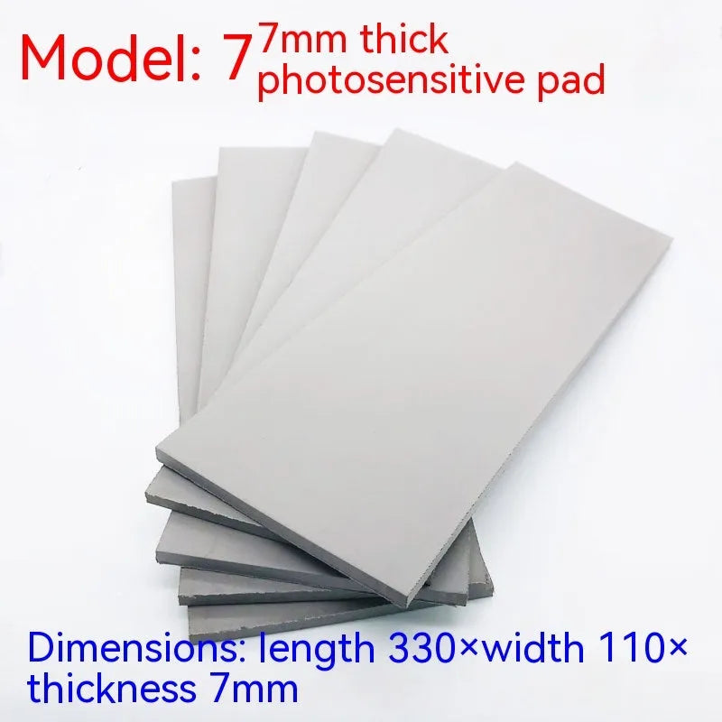 Black and grey plastic light-sensitive mat for seal creation with three thickness options