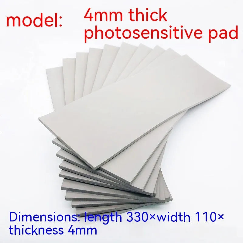 Black and grey plastic light-sensitive mat for seal creation with three thickness options