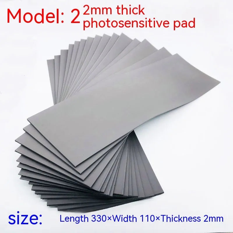 Black and grey plastic light-sensitive mat for seal creation with three thickness options