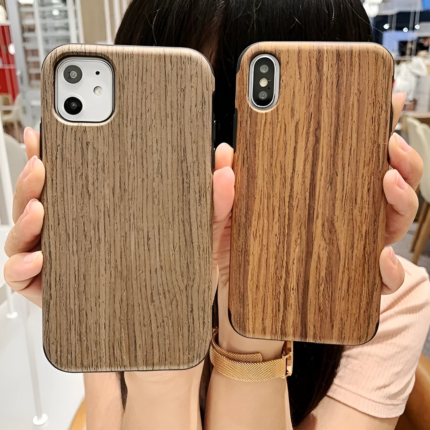 Wooden iPhone case with natural wood grain showing rosewood finish on iPhone 11 Pro