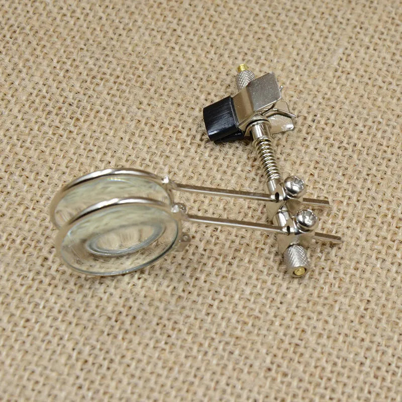 Auxiliary reading glasses clip with metal bracket and glass lenses for adding magnification to eyewear