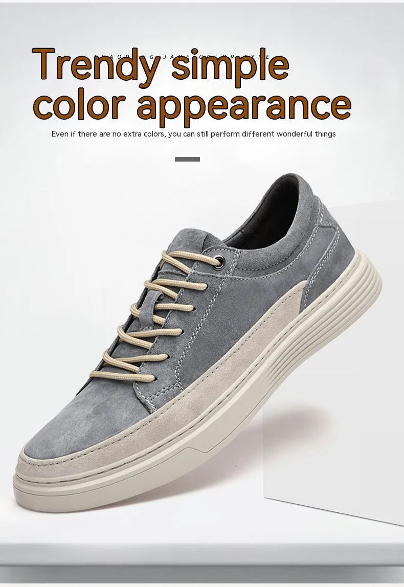 Men's grey casual skate shoes with pigskin upper and rubber sole showing lace-up front design