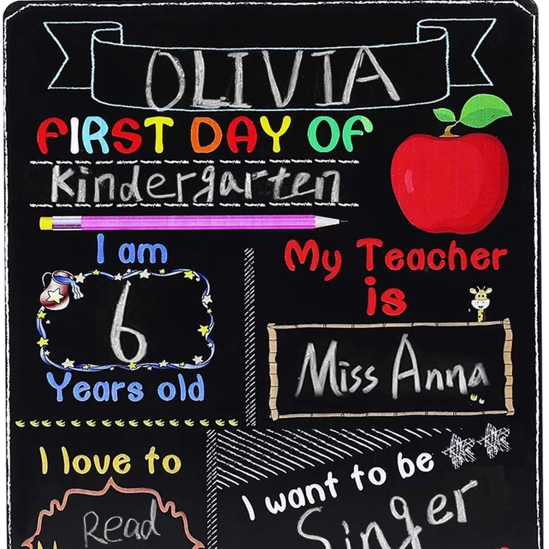Wooden first day of school blackboard ornament measuring 25.5 by 30 centimetres.