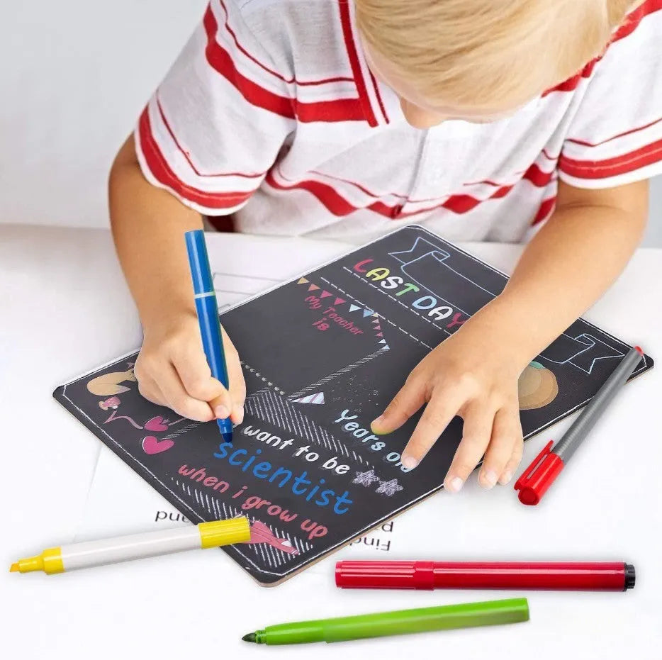 Wooden first day of school blackboard ornament measuring 25.5 by 30 centimetres.