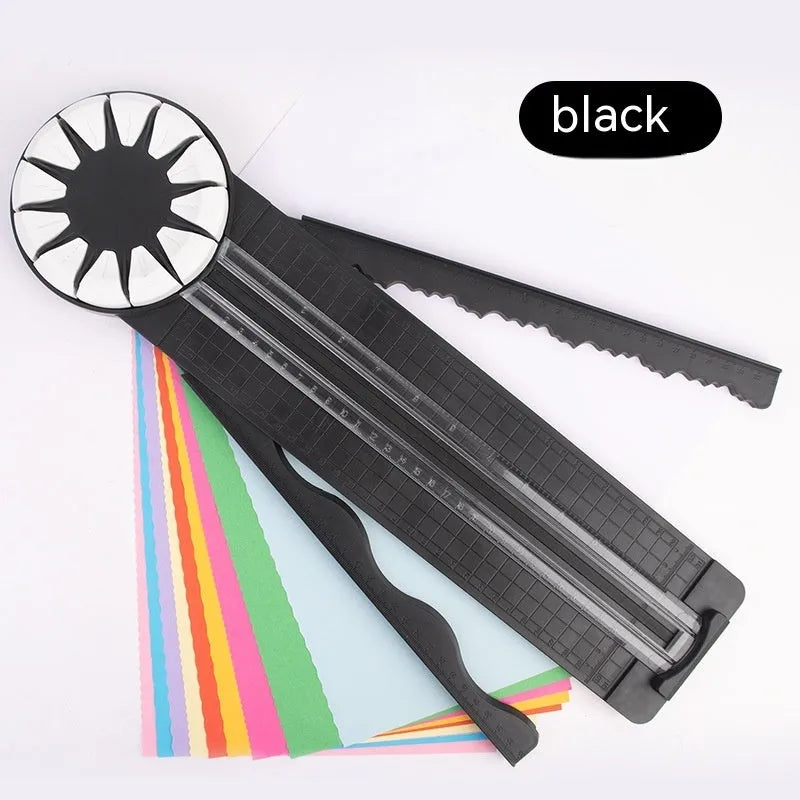 Plastic paper cutting machine with 12 patterns in pink colour on craft table