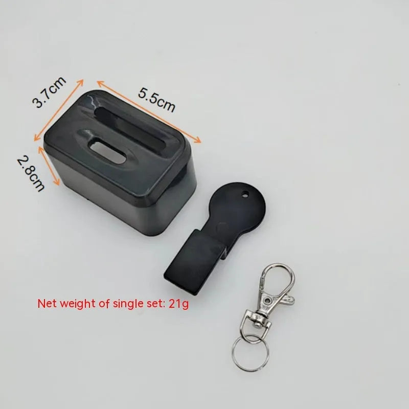 Black ABS plastic seat belt lock clamp holder securing car seat belt buckle