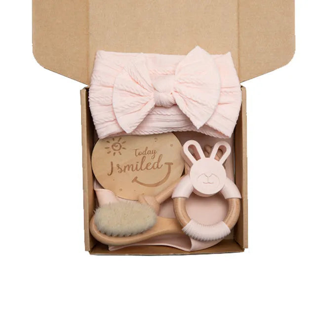 Newborn baby shower toy set of six bath toys in wood and chemical fibre, available in blue, brown, or peach