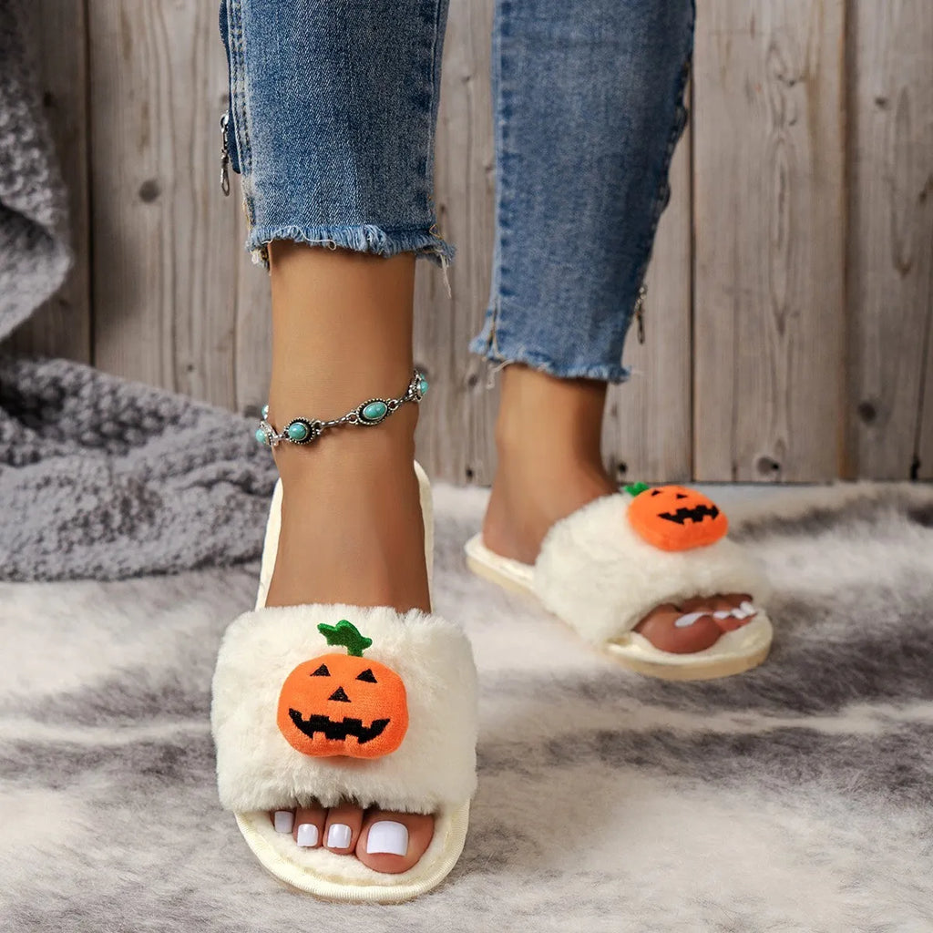 White and yellow Halloween cartoon pumpkin plush open-toe slippers with anti-slip PVC soles.