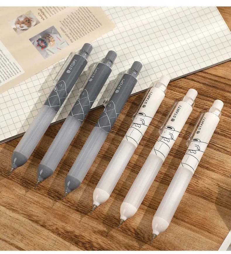 Black and white 0.5mm mechanical pencils with Cloud Grip, HB lead, on a minimalist background.