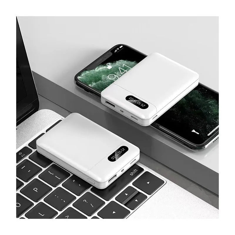 Black and white portable power bank showing dual USB ports and compact 92x63x23mm dimensions