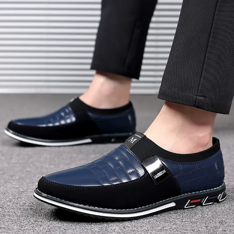 Slip-on men's plus size casual leather shoes in black with round toe and rubber sole