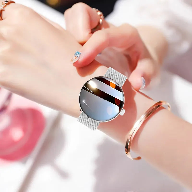Smart watch with circular colour screen and metal strap showing heart rate monitoring display