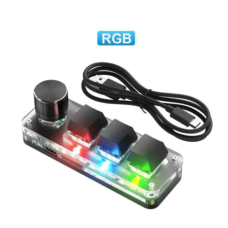Black programmable mini keyboard with RGB backlit keys for copy and paste commands.