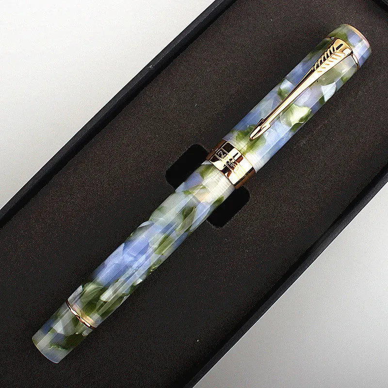 Deep bath green metal pen showing fine, medium, and graphic art tip options