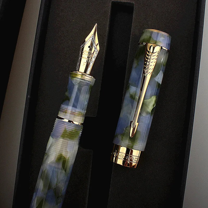 Deep bath green metal pen showing fine, medium, and graphic art tip options