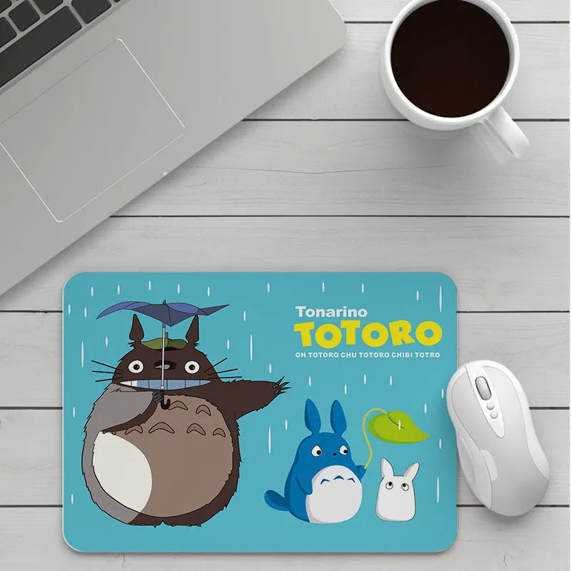 Custom cartoon mouse pad with thickening, showing example artwork on non-slip rubber and cloth base.