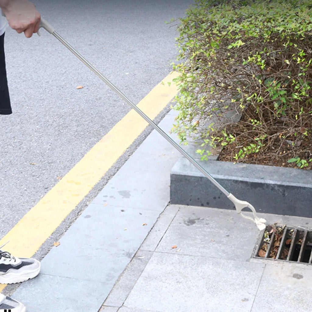 Stainless steel garbage picker with 40cm length and push-handle design for one-handed operation