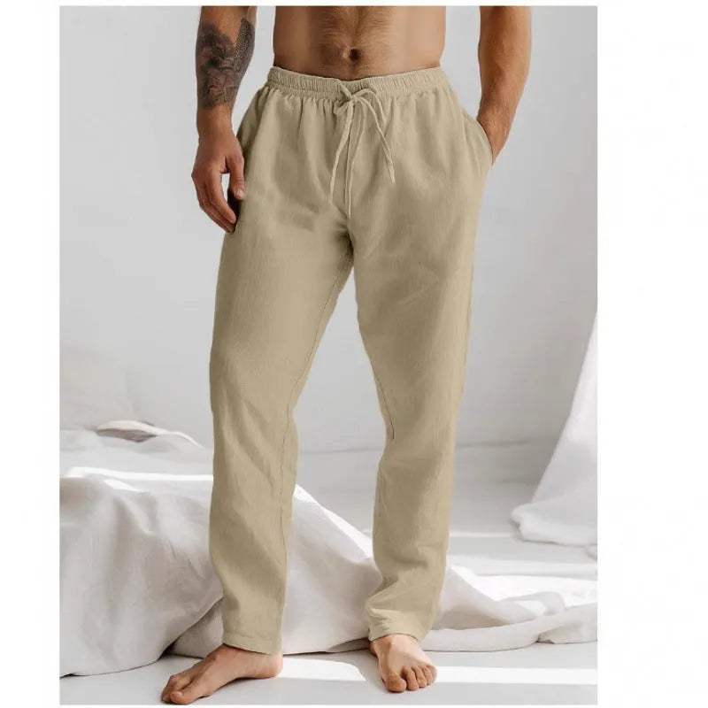 Men's light grey loose-fit summer trousers with elastic waistband and straight leg opening