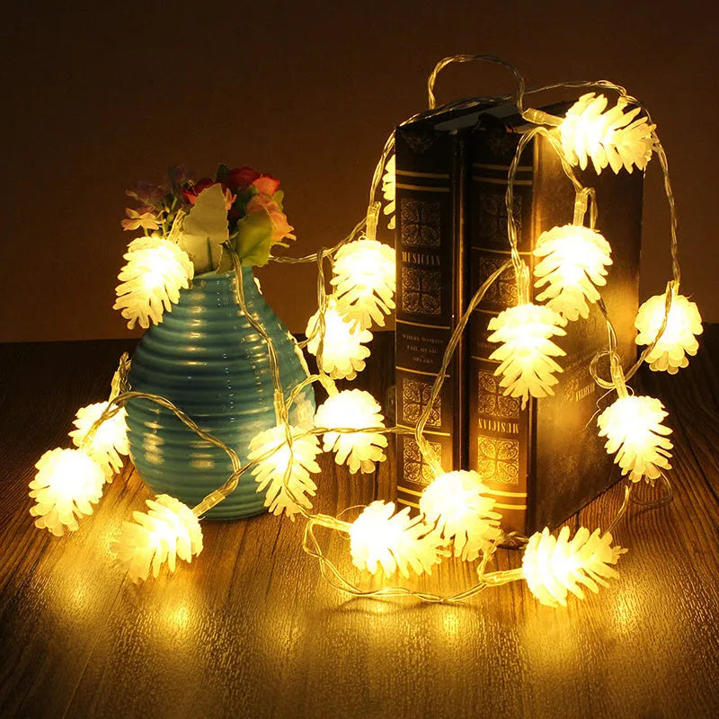 Warm white LED pine cone battery-powered string light draped decoratively