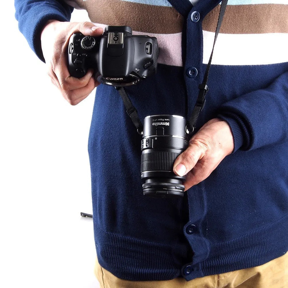 Nikon E-mount camera lens flipper with aluminium body and cotton shoulder strap