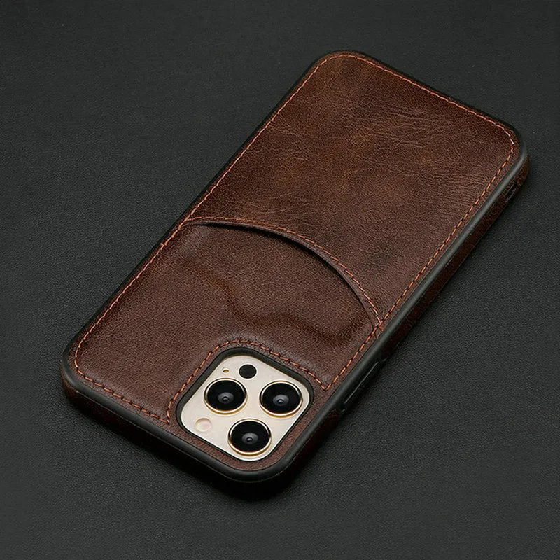 Dark blue PU leather protective case for iPhone on a table.