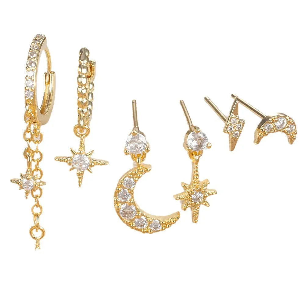 Set of six gold-coloured XINGX women's earrings with zircon studs and chain tassels.
