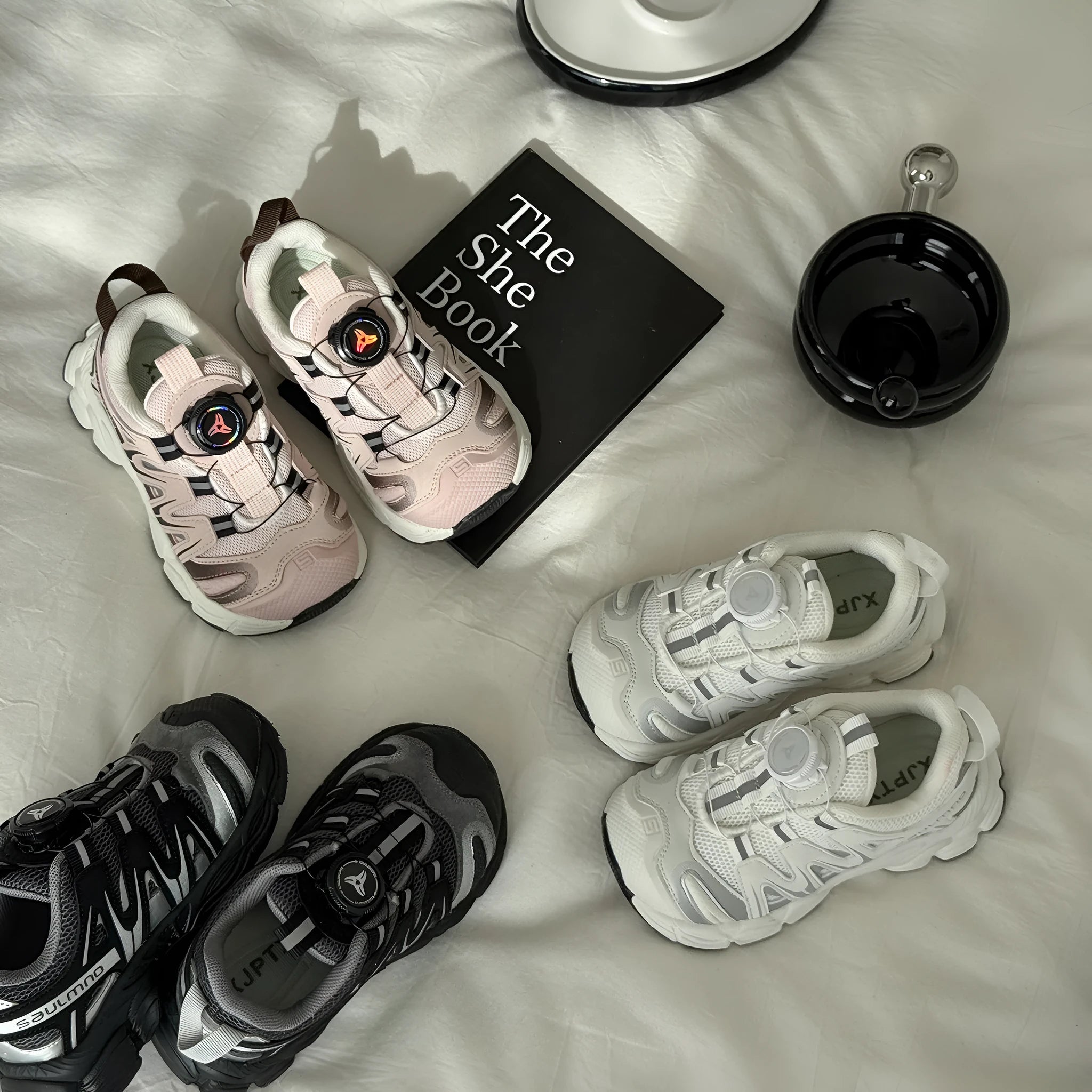 Girls casual slip-on shoes in black, beige, and pink with breathable mesh upper