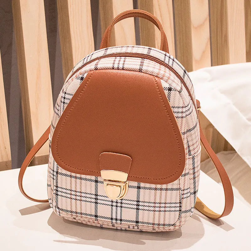 Diagonal one shoulder phone bag in PU leather available in five colours.