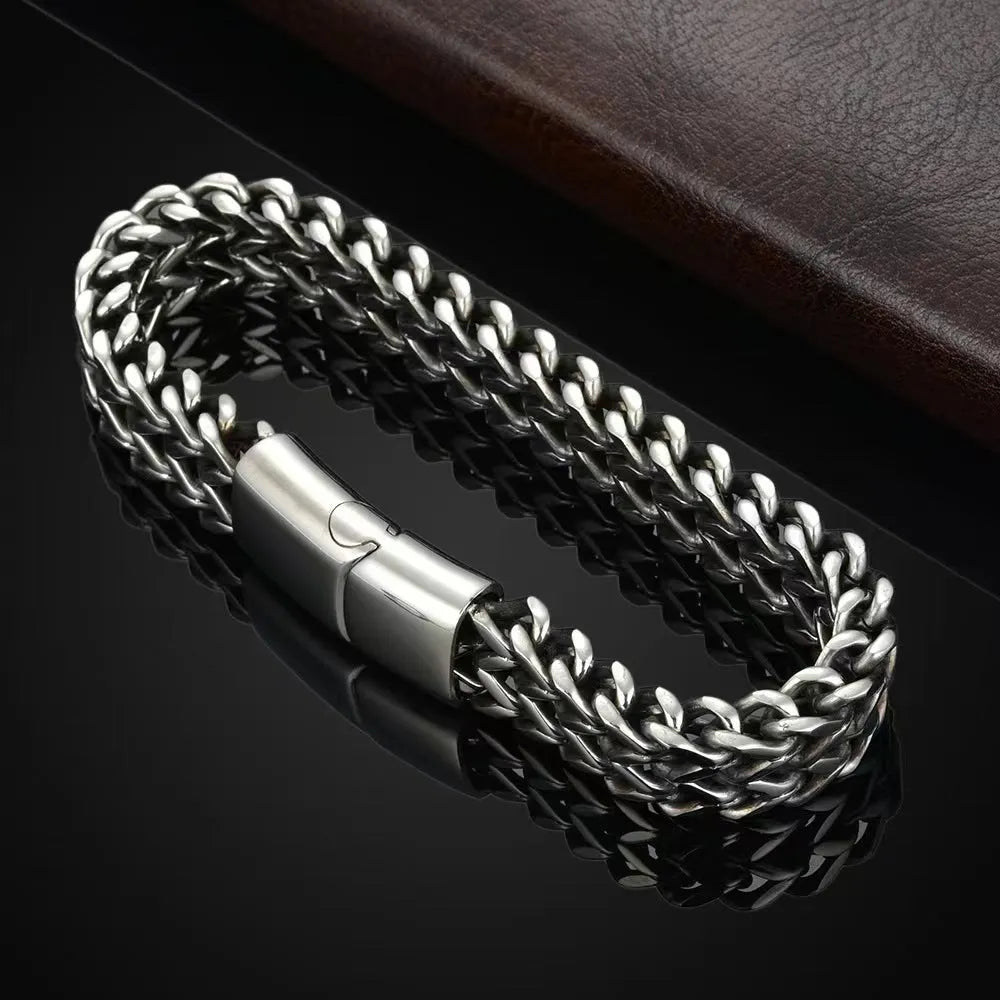 Geometric stainless steel men's bracelet showing front and back design in silver colour