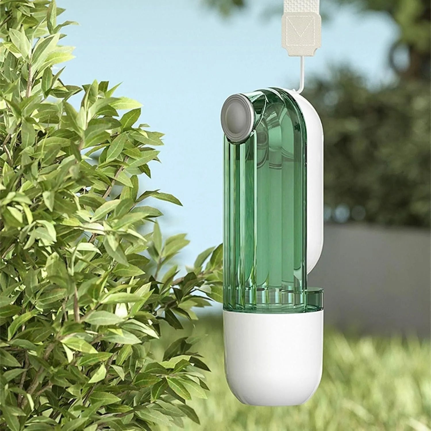Foldable dog water bottle with food container in beige or green colour, showing drinking tray and dispenser mechanism