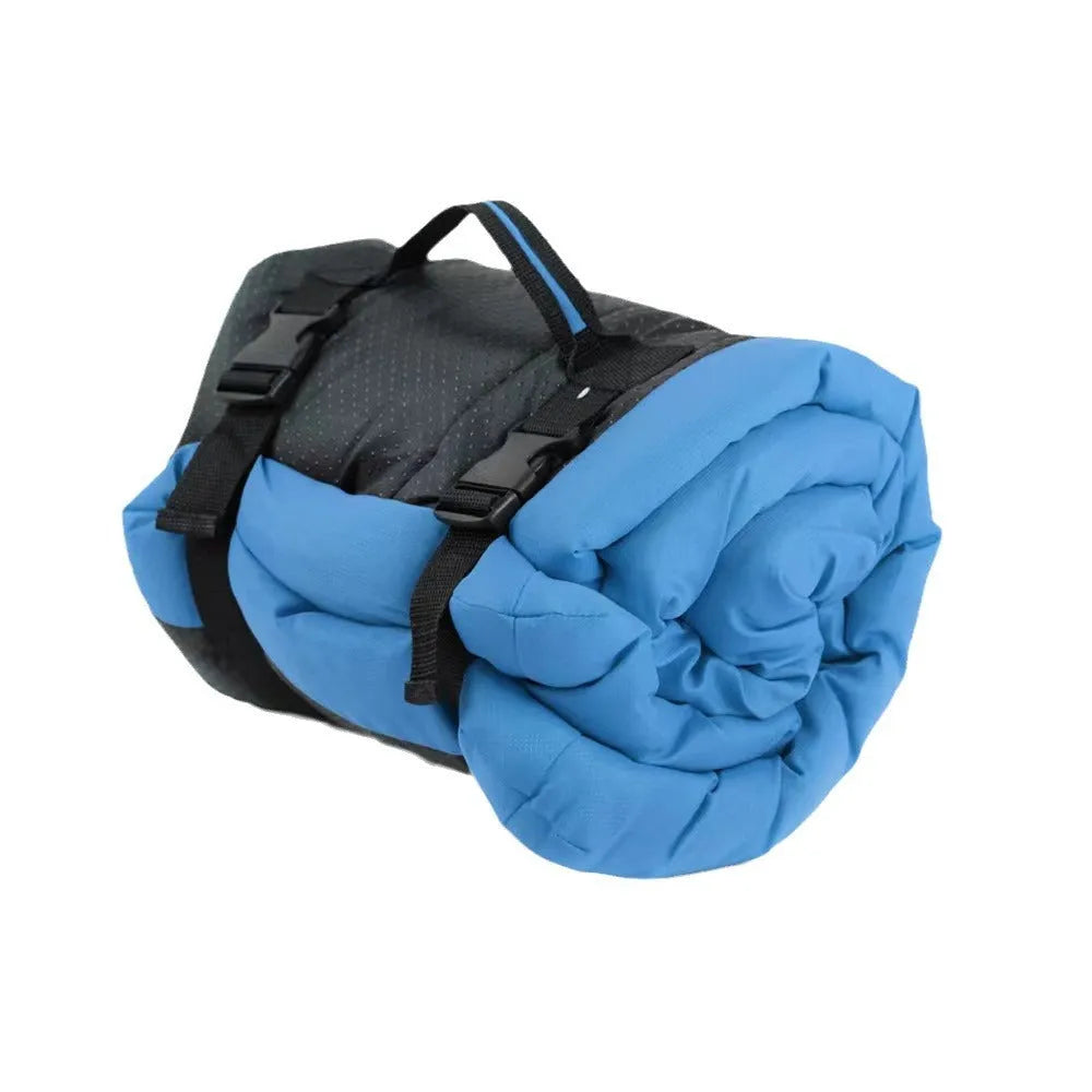 Blue foldable waterproof dog bed shown both unfolded and compactly folded with buckles.