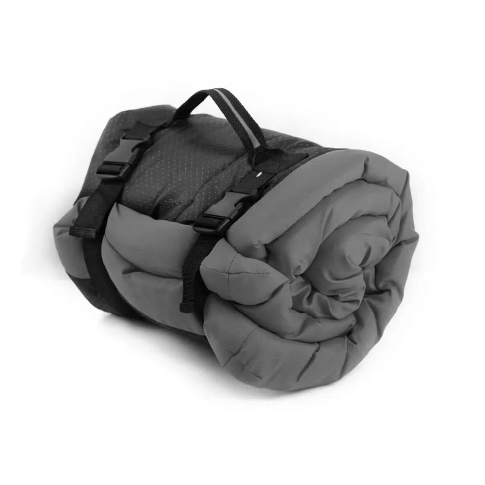 Blue foldable waterproof dog bed shown both unfolded and compactly folded with buckles.