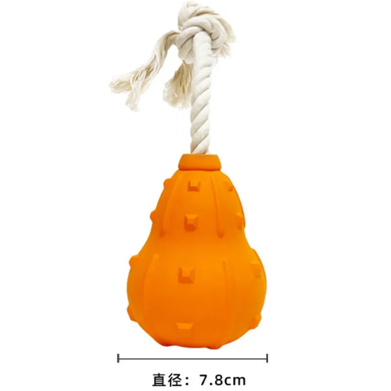 A long, brown, natural rubber stuffable dog toy for small medium breeds, shown with a treat inside.