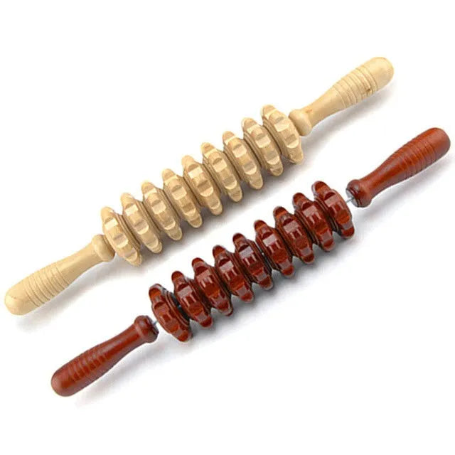 Wooden massage roller 38cm placed on surface, used for back and leg muscle trigger point recovery