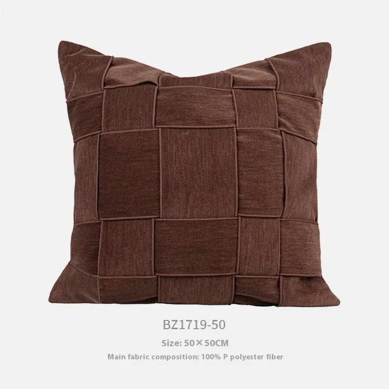 Square chenille woven cushion in beige colour on a grey sofa, 50x50cm size.
