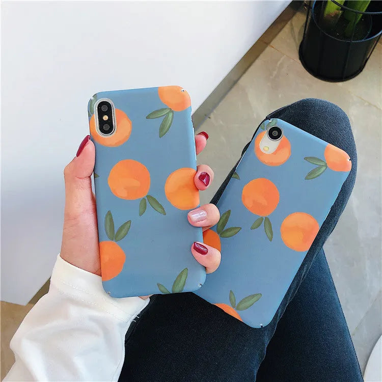 Orange retro plastic iPhone case with water and blue background design shown on smartphone