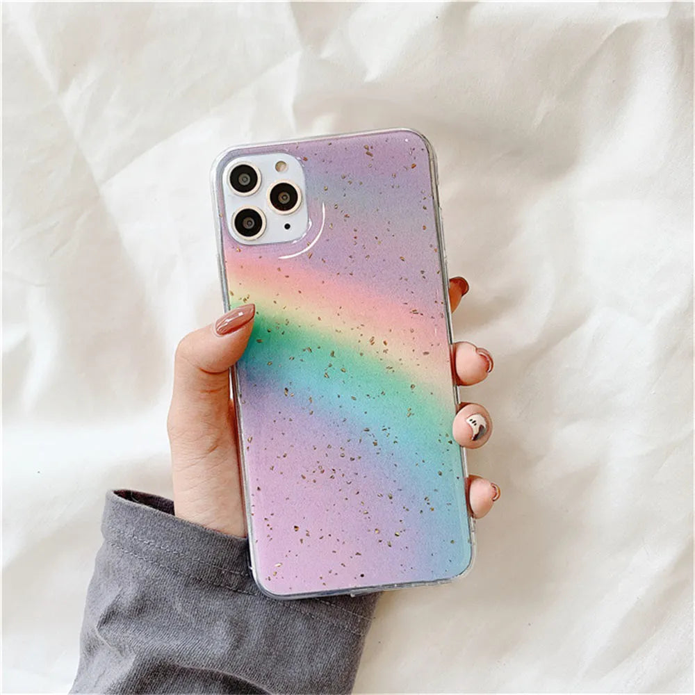 Rainbow gradient iPhone case with striped design on a phone