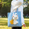 Soft canvas pet carrier shoulder bag for cats and small dogs in a cartoon rabbit design.