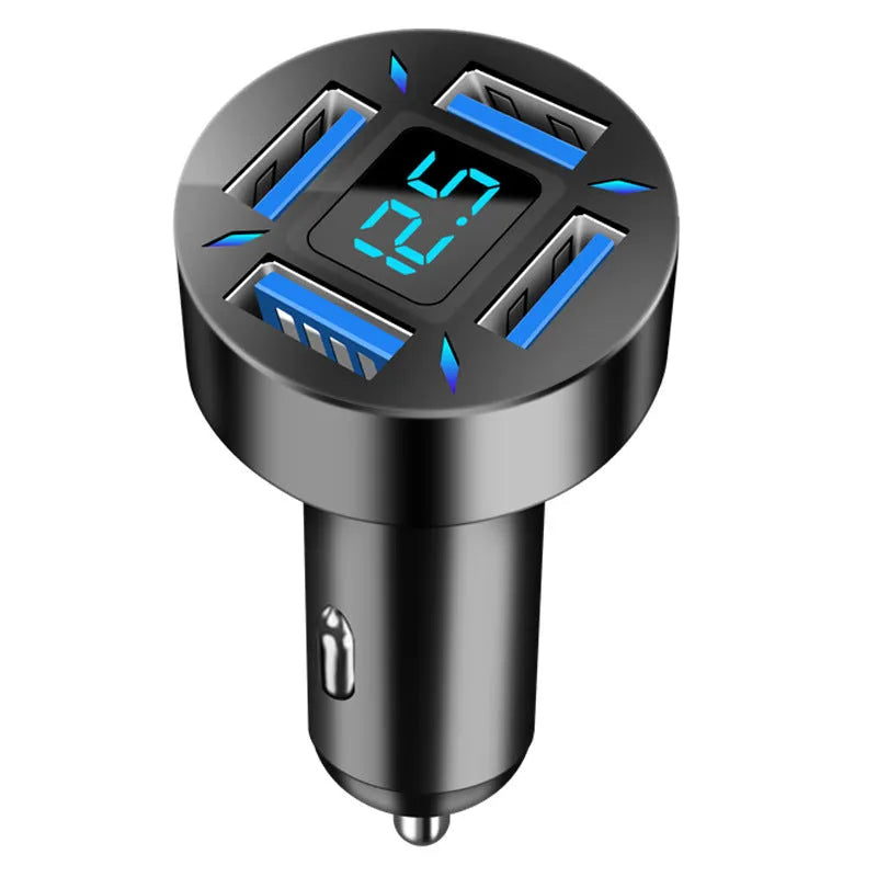 Black four-port USB car charger with digital LED display, shown plugged into a car dashboard.
