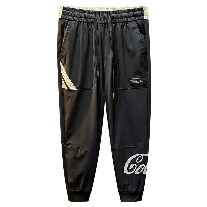 Black men's cropped casual trousers with ankle band made from ultra-thin ice silk cotton fabric.